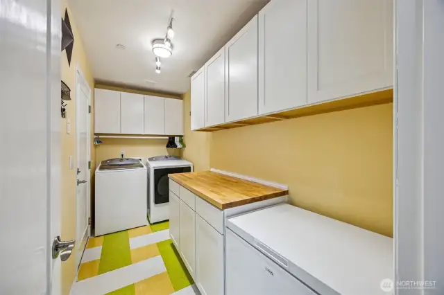 Abundant pantry and laundry storage built in. Freezer will convey with the home!