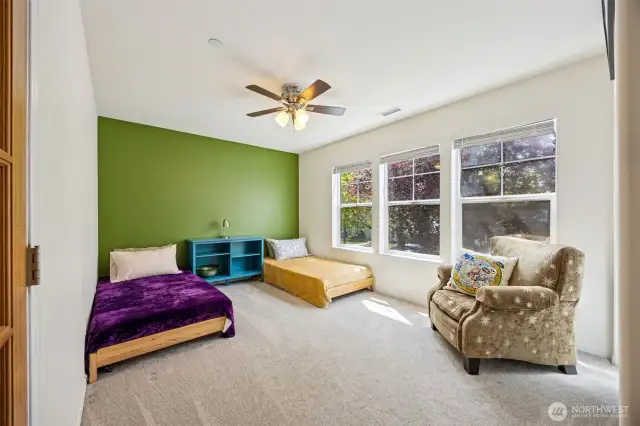 Bedroom 1 with ceiling fan.