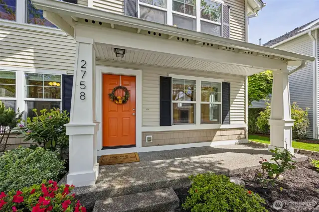 Spacious front covered porch. Irrigation system for yard.