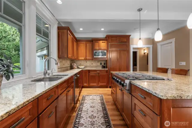 Granite Slab Counters and Custom Cabinetry.
