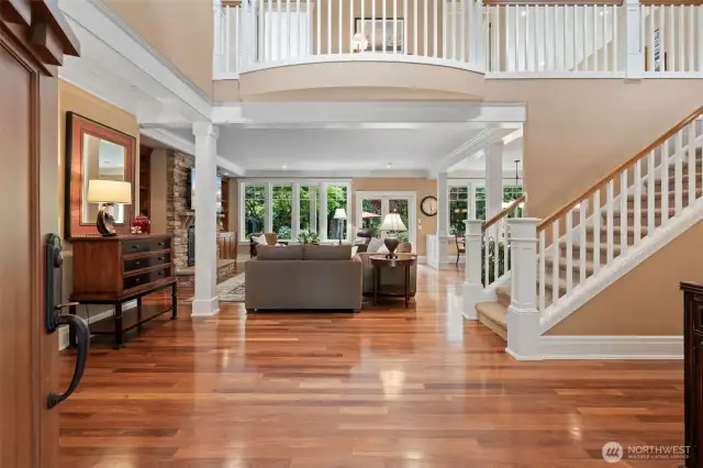 Walk into gorgeous Brazilian Teak hardwood floors and territorial views looking out back.