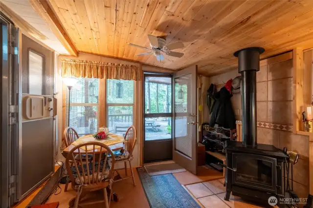 Side room has a wood stove which keeps things warm when needed.