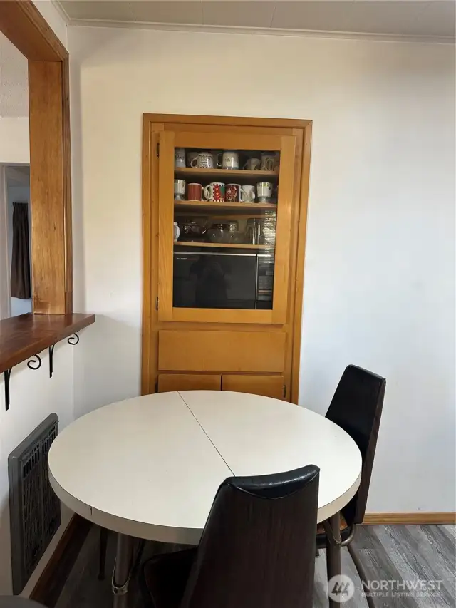 Dining area in the kitchen with built in.