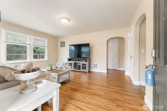Beautiful floors, coved passthroughs, lots of windows