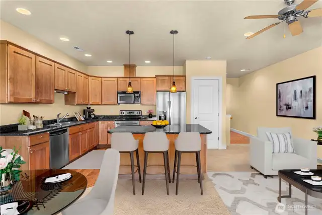 Open-concept kitchen with breakfast bar, perfect for casual dining or entertaining