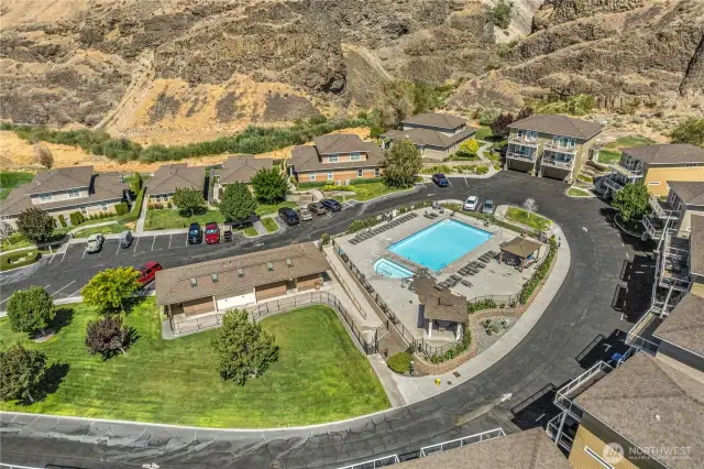 Aerial view of the property and surrounding amenities