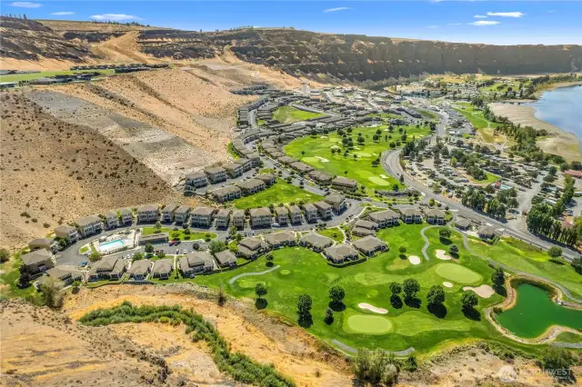 Aerial view of the property and surrounding amenities