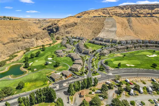 Aerial view of the property and surrounding amenities
