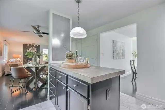 Island with concrete slab countertops