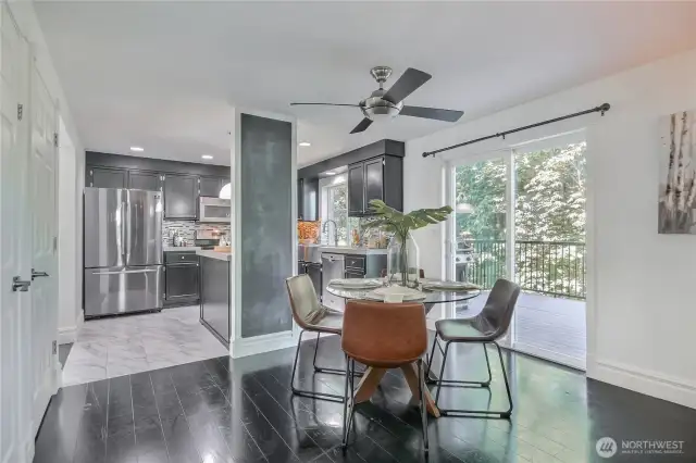 Breakfast nook with sliding door to deck