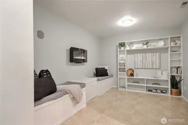 Lower level bonus area with large storage closet and built in shelving