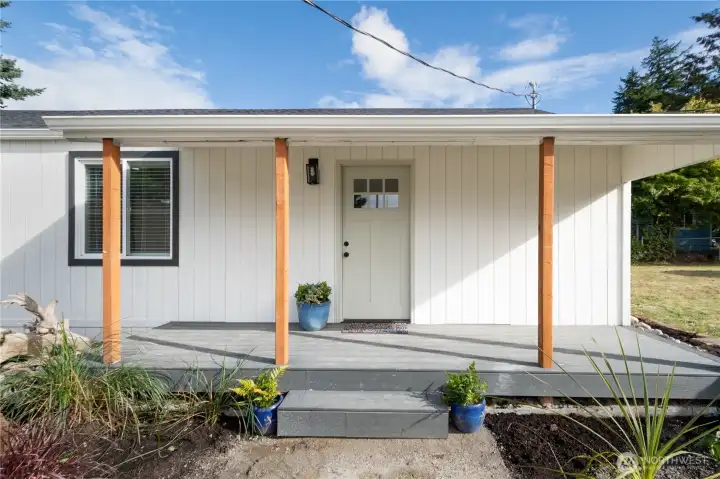 Fresh exterior paint, porch posts, landscpaing