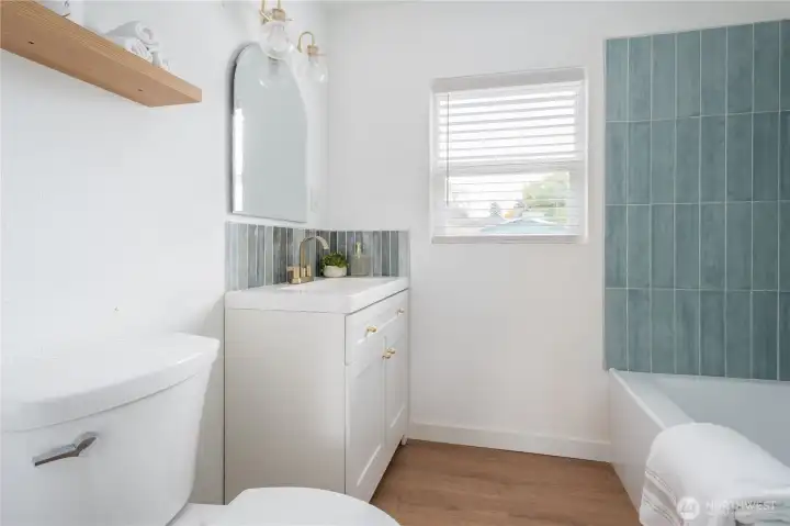 New vanity, tile backsplash and tub. ALL new!