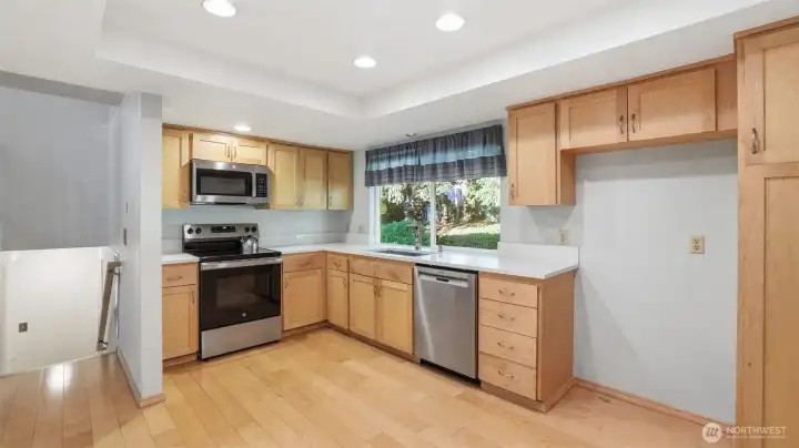 Complete this kitchen with you choice in fridge, and add an island or small table for more informal dining or gathering.