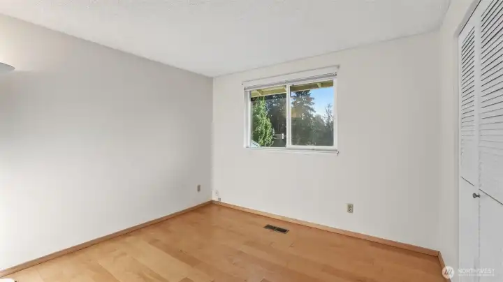 Another view of the lower level guest room without the virtual staging. This space is perfect for hobby room, home office, gym, guest room, or multi-gen living.