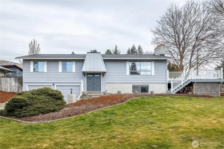 Beautifully updated home on a large corner lot with parking for 8+ vehicles - do NOT miss this one