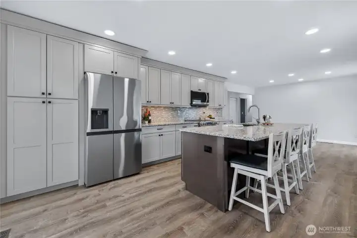Large "pantry" cabinet with pull outs. Freezer makes TWO kinds of ice!!