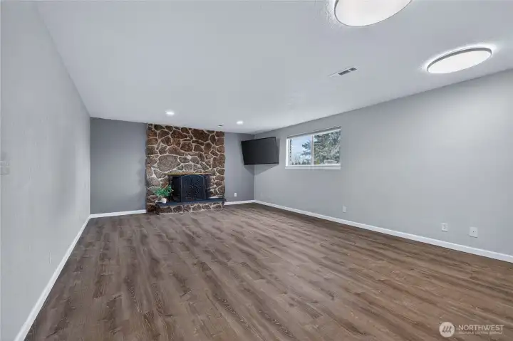 Lower level family room. TV stays