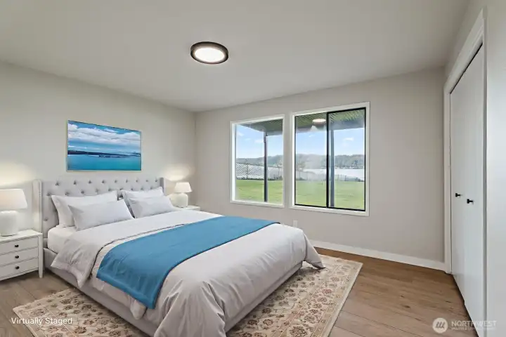 downstairs bedroom facing the lake virtually staged