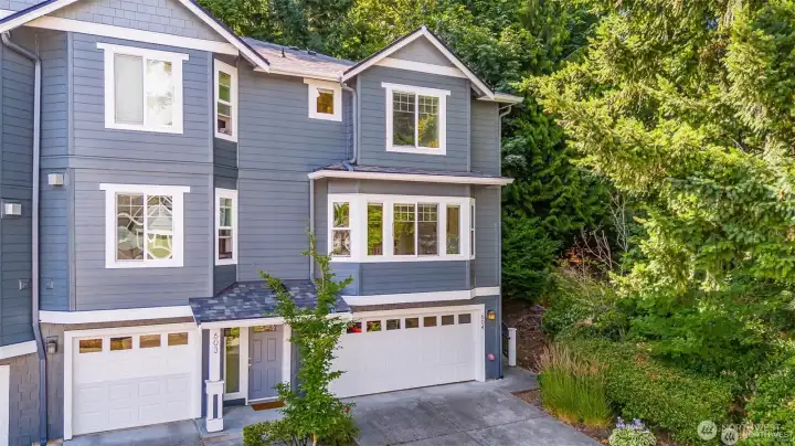 2 car side-by-side garage and driveway parking.