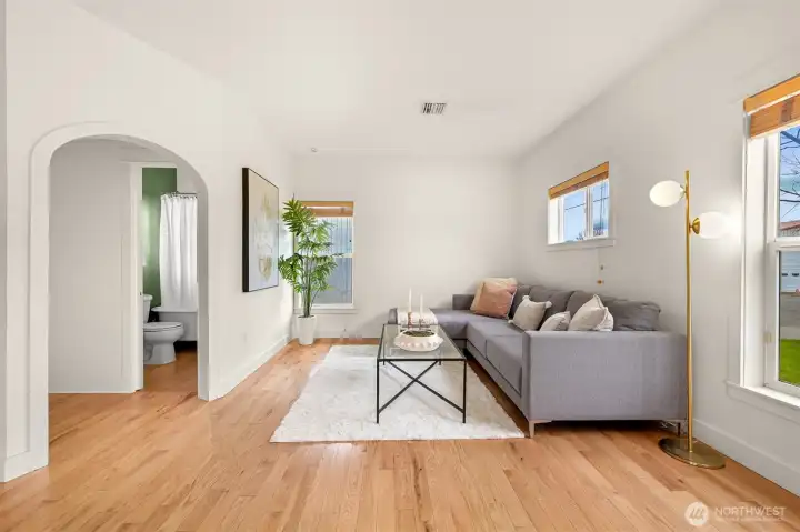 Charming curved entry to a bedroom and bathroom.