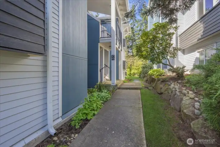 Sidewalk leading to the home.