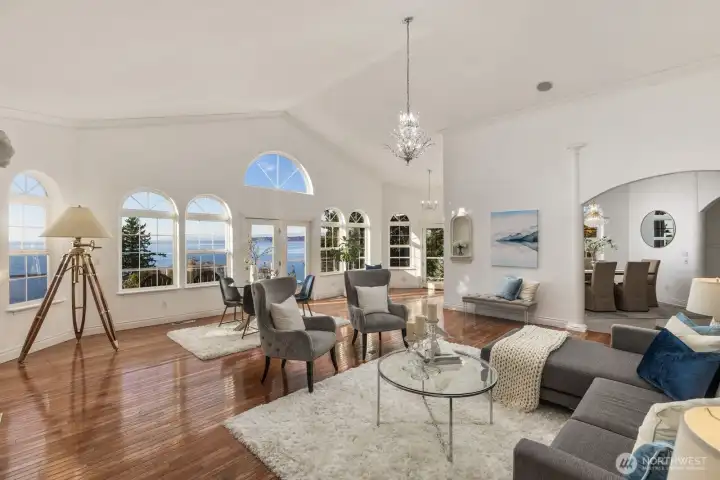 A great room that opens wide to the water, where space, light, and view all take center stage.