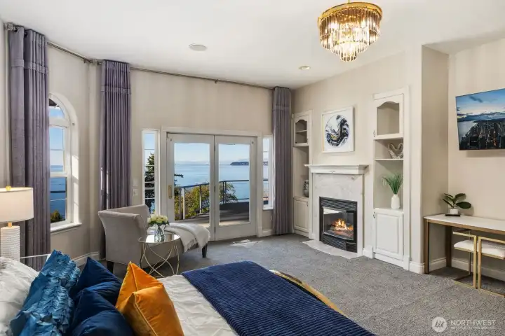 Wake to bay views and end your day by the fire in this serene primary retreat.