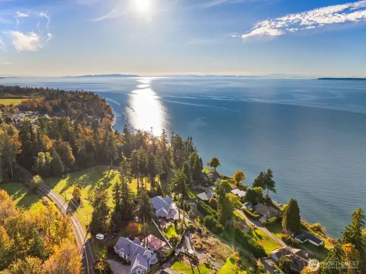 Glistening waters and sweeping coastal vistas define this rare vantage point along Semiahmoo Bay.