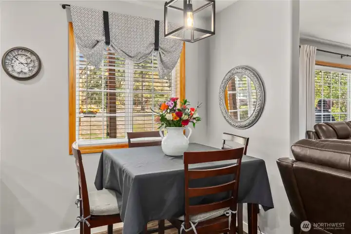 Positioned between the kitchen and family room, the breakfast nook keeps everyone connected—ideal for quick breakfasts, homework, or conversation while meals are prepared.