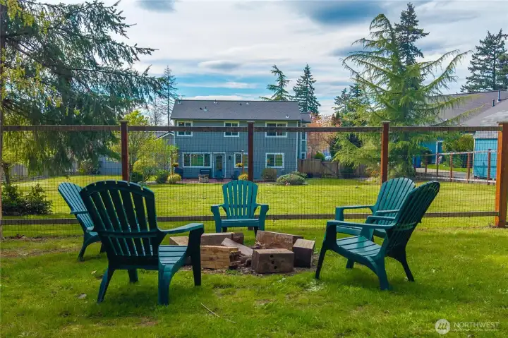 A backyard fire pit sets the stage for evenings under the stars—whether it’s roasting marshmallows, sharing stories, or unwinding with a glass of wine.