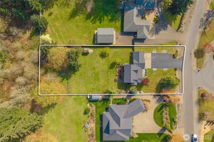 Imagine a backyard where the only neighbors behind you are the trees. Perfectly positioned in a quiet, established neighborhood, this home offers the rare combination of suburban comfort and total serenity.    The expansive, manicured lawn serves as a blank canvas for your lifestyle—whether you’re dreaming of a championship-sized garden, a play paradise, or a peaceful retreat for summer BBQs on the patio. With a lush wooded border providing natural privacy and plenty of room to breathe, this isn’t just a house; it’s your own personal park.    Highlights include:    Expansive Lot: One of the most generous green spaces in the area.    Prime Location: Tucked away on a peaceful street with mature landscaping.    Outdoor Living: A dedicated patio area perfect for entertaining or unwinding.    Why settle for a standard lot when you can have a sanctuary? Come see where your next chapter begins. (Boundary lines are approximate)