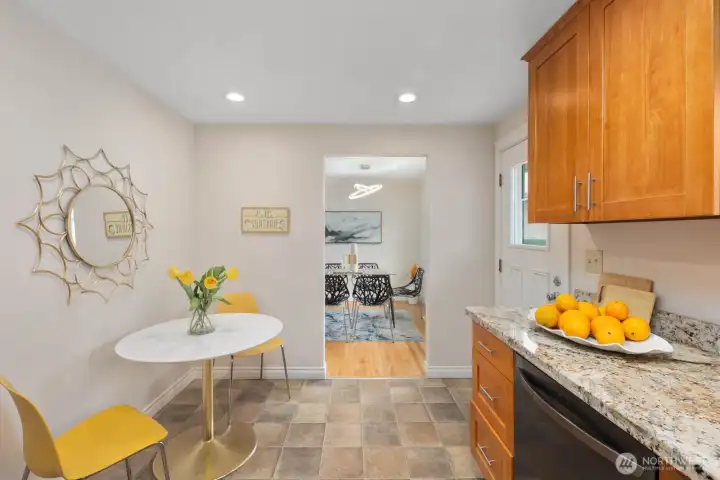 Upstairs kitchen with charming eating nook