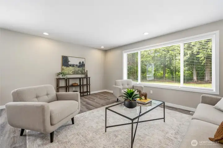 Bright living spaces with peaceful views of the surrounding property