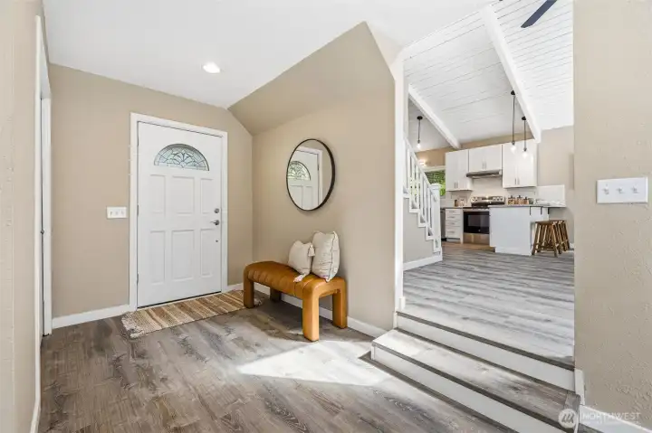 Welcoming entry with updated finishes and open sightlines