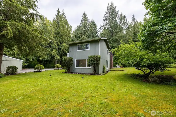 Blend of open space, privacy, and wooded surroundings