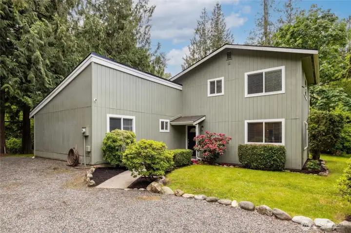 Updated home surrounded by natural beauty and privacy