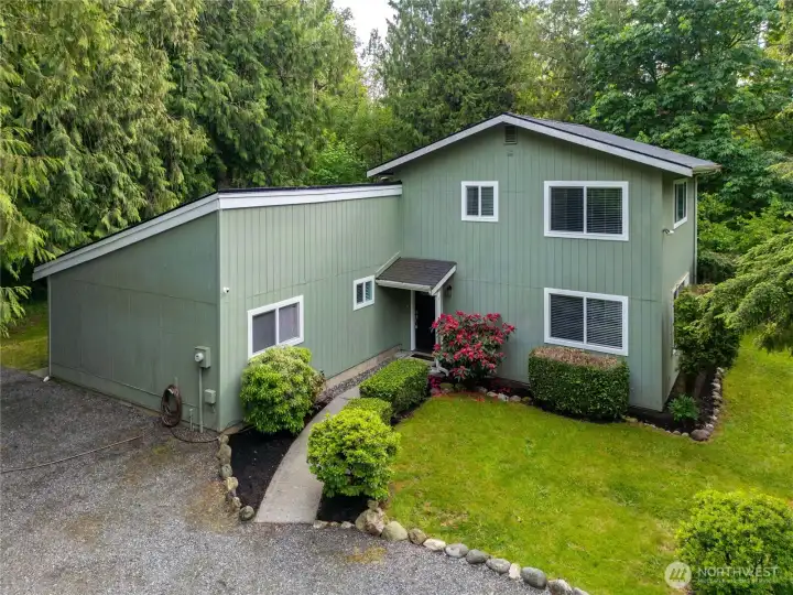 Updated home with mature landscaping and a private setting