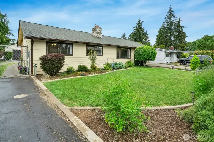 This one-level home is full of surprises! Lives as two separate dwellings or a four bedroom residence. Double driveway, tons of parking and two garages. This one-level home is full of surprises! Lives as two separate dwellings or a four bedroom residence. Double driveway, tons of parking and two garages.