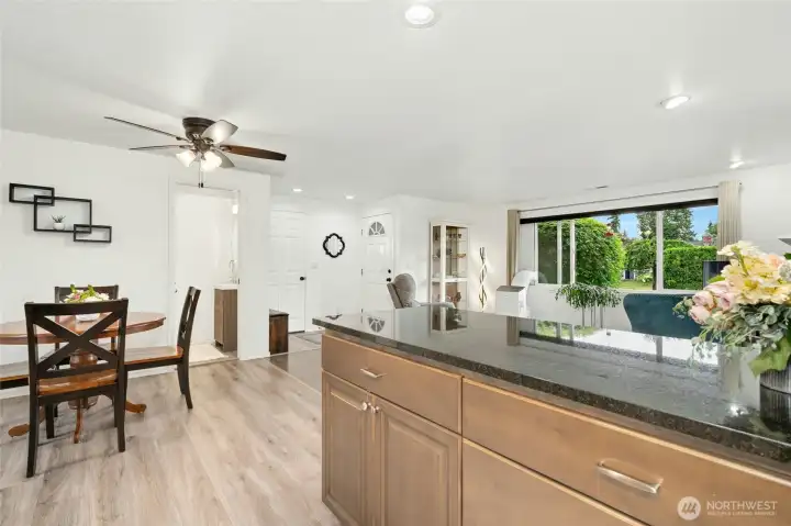 Luxury Vinyl Plank in kitchen and dining area. Luxury Vinyl Plank in kitchen and dining area.