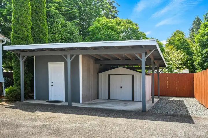 Extra Storage! Shed with Power and Tool Shed. Move the Tool Shed for Extra Covered Parking!