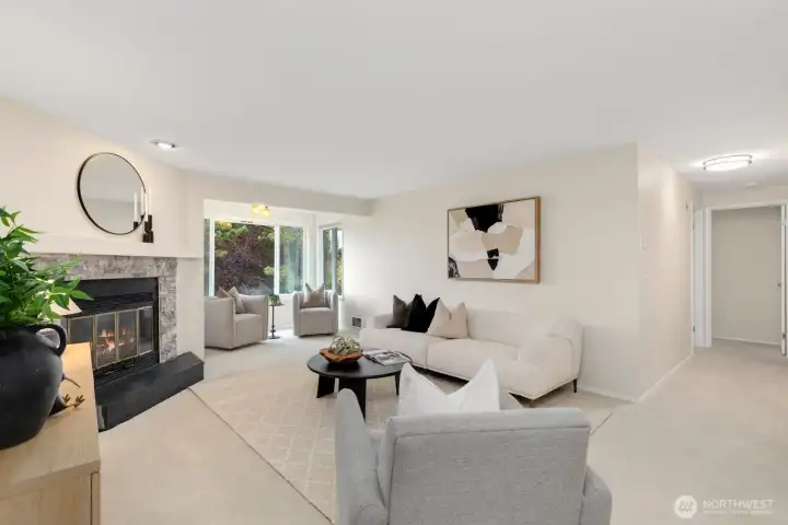 Superbly designed living areas that feature a wood-burning fireplace, a sunny reading nook that looks past the green lawn to a green belt, and plenty of space for guests to mingle about and make memories. Superbly designed living areas that feature a wood-burning fireplace, a sunny reading nook that looks past the green lawn to a green belt, and plenty of space for guests to mingle about and make memories.