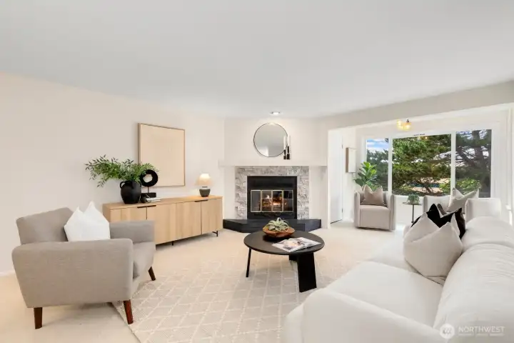 Superbly designed living areas that feature a wood-burning fireplace, a sunny reading nook that looks past the green lawn to a green belt, and plenty of space for guests to mingle about and make memories. Superbly designed living areas that feature a wood-burning fireplace, a sunny reading nook that looks past the green lawn to a green belt, and plenty of space for guests to mingle about and make memories.