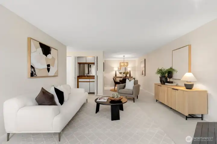 Straight-on view of the main living room area, dining room and wet bar. Straight-on view of the main living room area, dining room and wet bar.