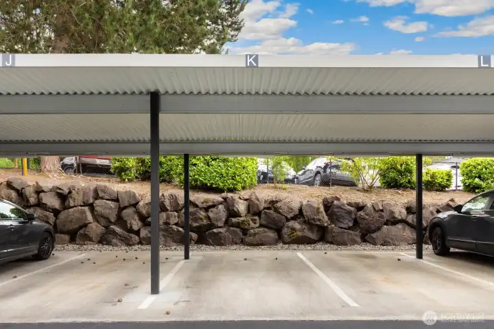 Parking spot K is steps to the lobby and elevator. Parking spot K is steps to the lobby and elevator.