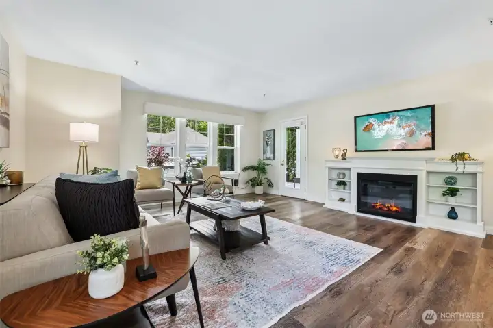 Electric fireplace and mantel will stay with home. Electric fireplace and mantel will stay with home.