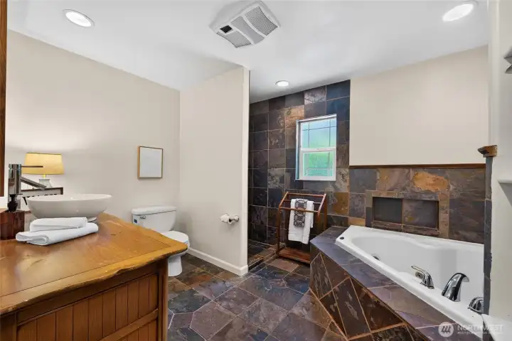 Elegant tile work enhances the primary bath with both beauty and durability. Elegant tile work enhances the primary bath with both beauty and durability.