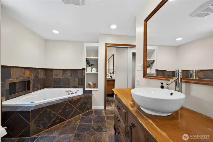 The spacious jetted tub offers a spa-like escape in the comfort of your own home. The spacious jetted tub offers a spa-like escape in the comfort of your own home.