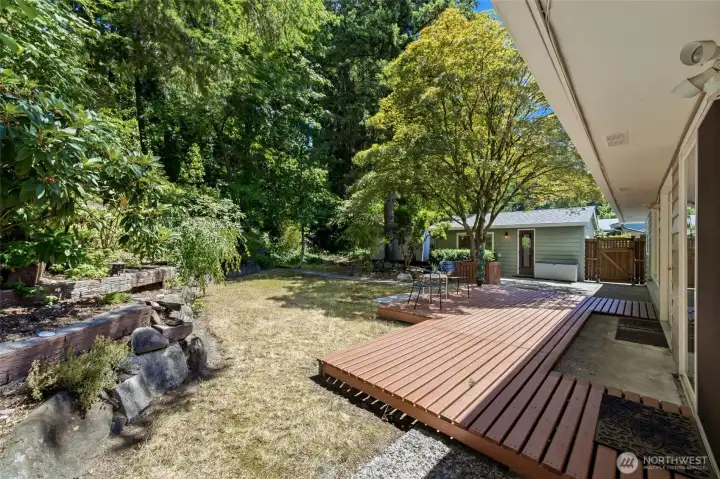 Step outside to a secluded backyard oasis where privacy and tranquility come together. Step outside to a secluded backyard oasis where privacy and tranquility come together.