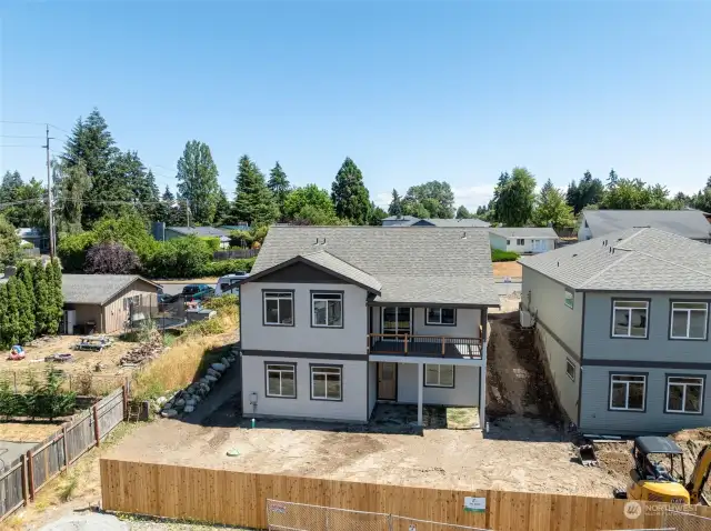 This home features one of the biggest yards in the 9-home community!